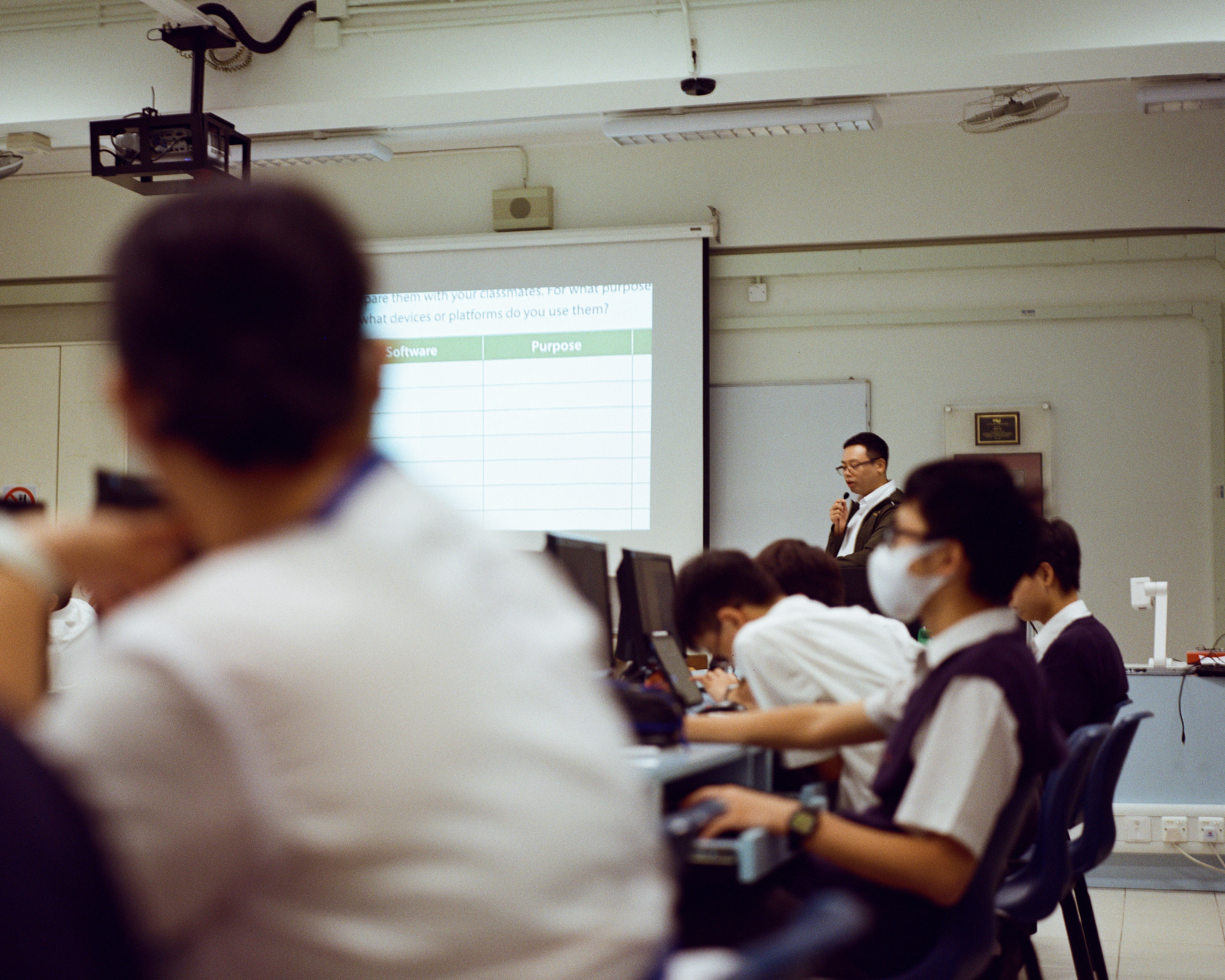 Students watching a presentation on Cyber risks in Hong Kong