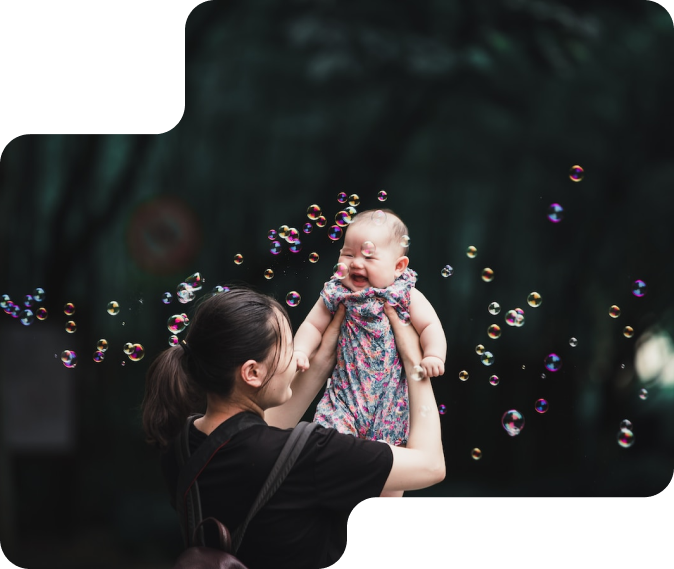 Chinese mom holding a baby