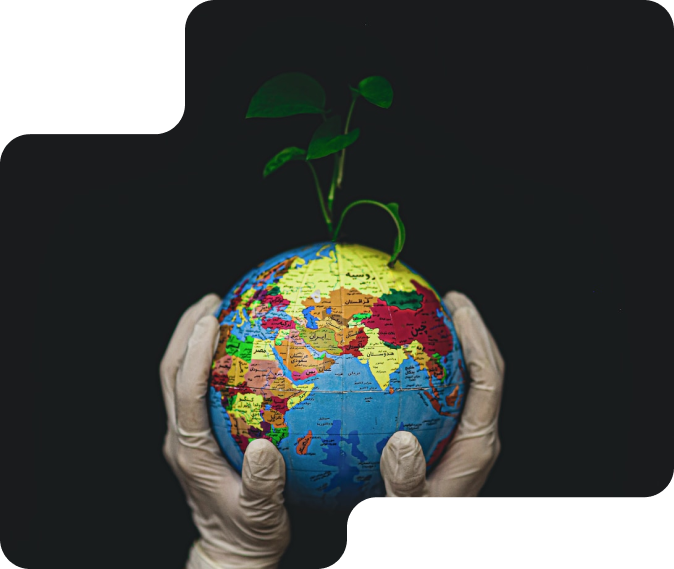 Holding a globe with grass