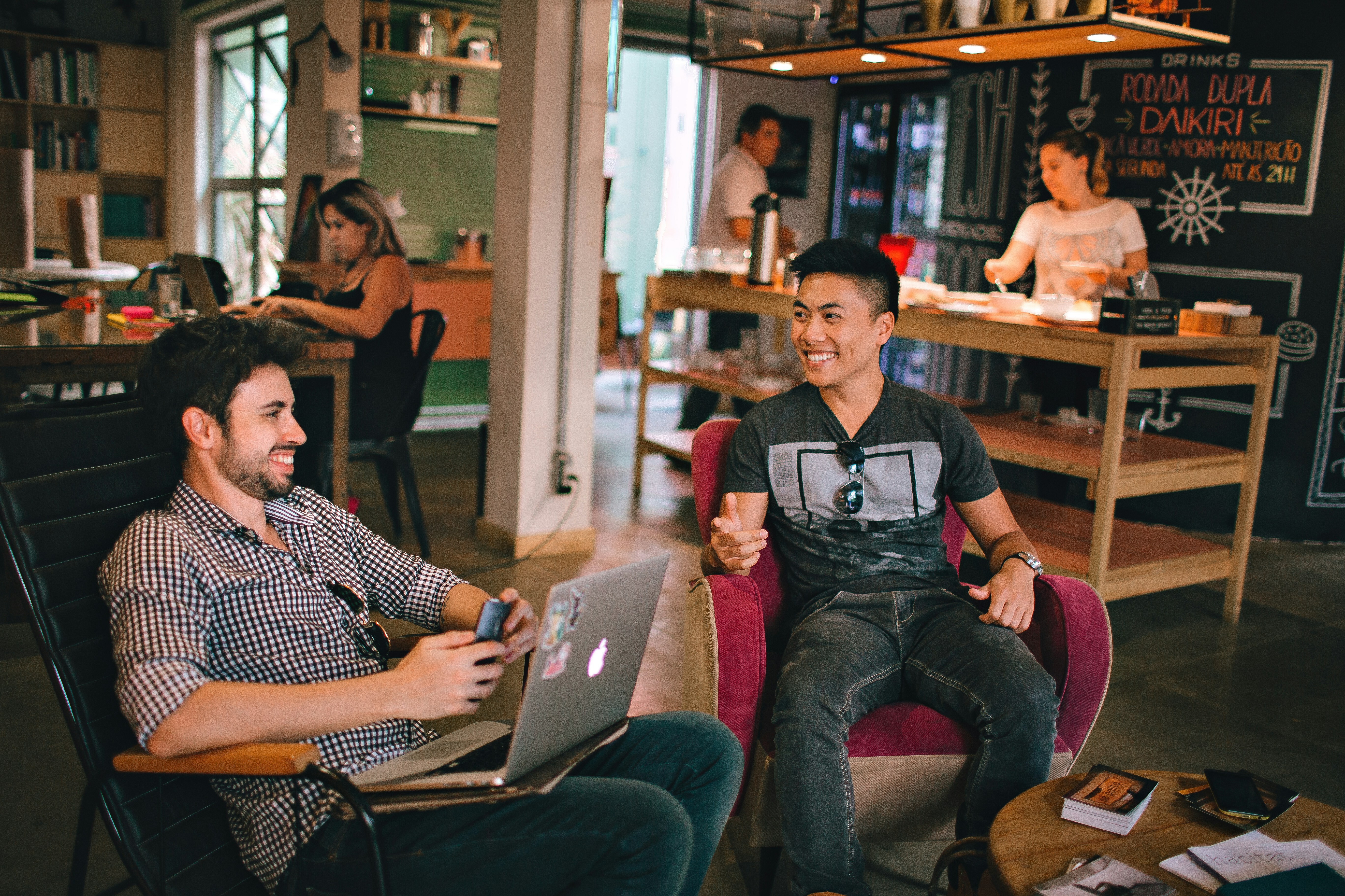 two men having a meeting in a coworking space