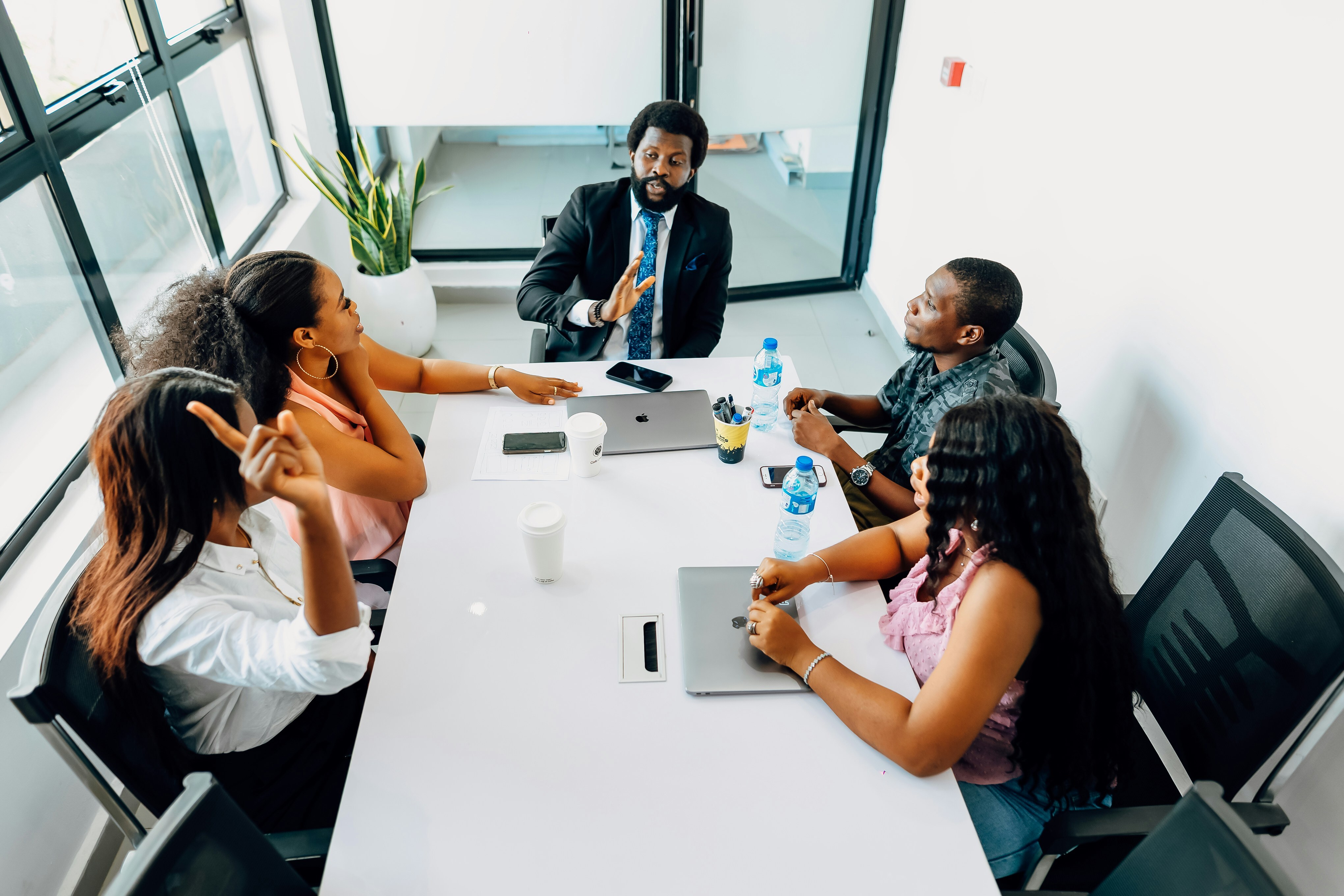 Group of business professionals meeting in the board room